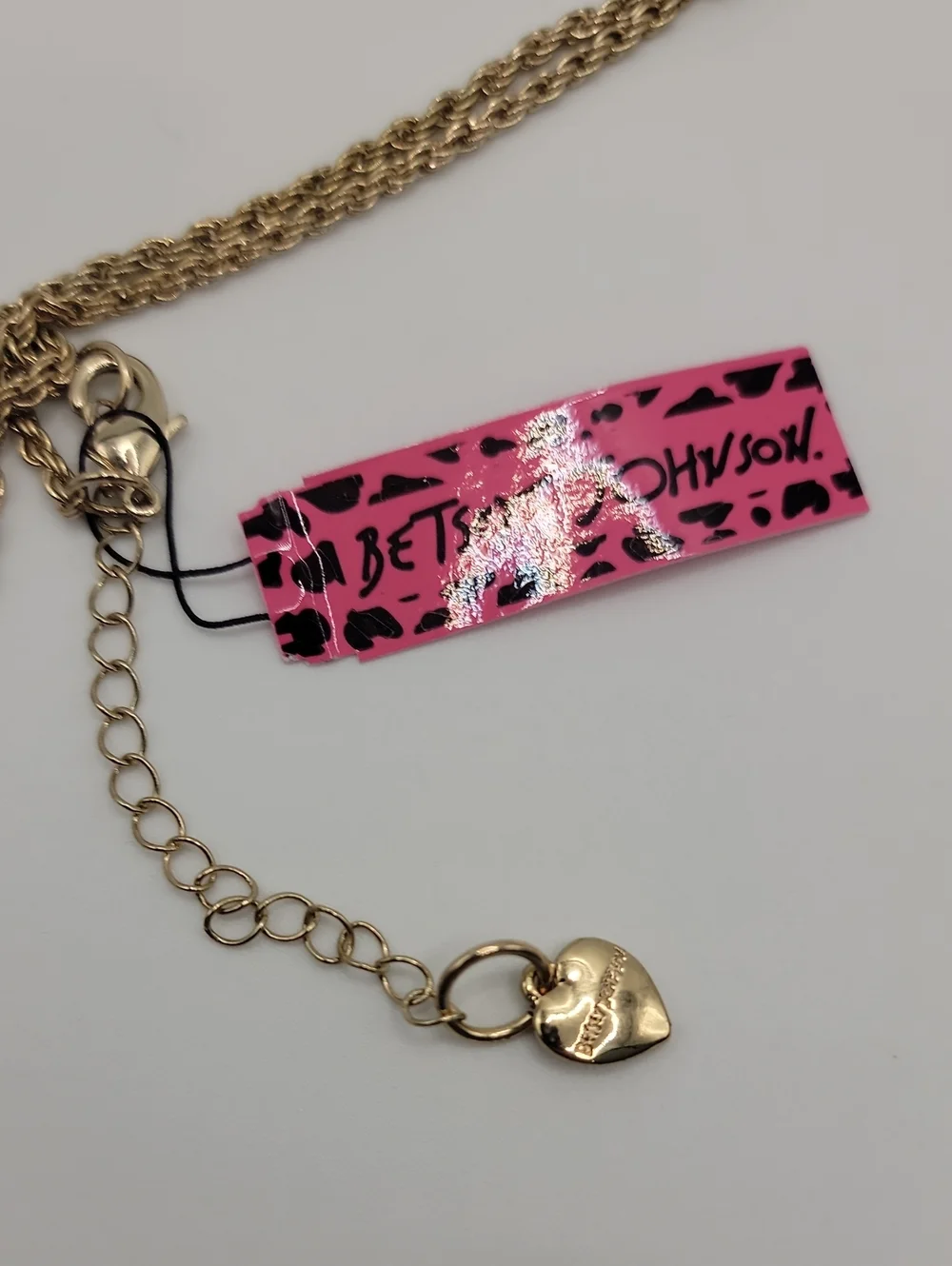 Betsey Johnson Gold Cross Pendant Necklace with Purple, Blue, Coral Accents
